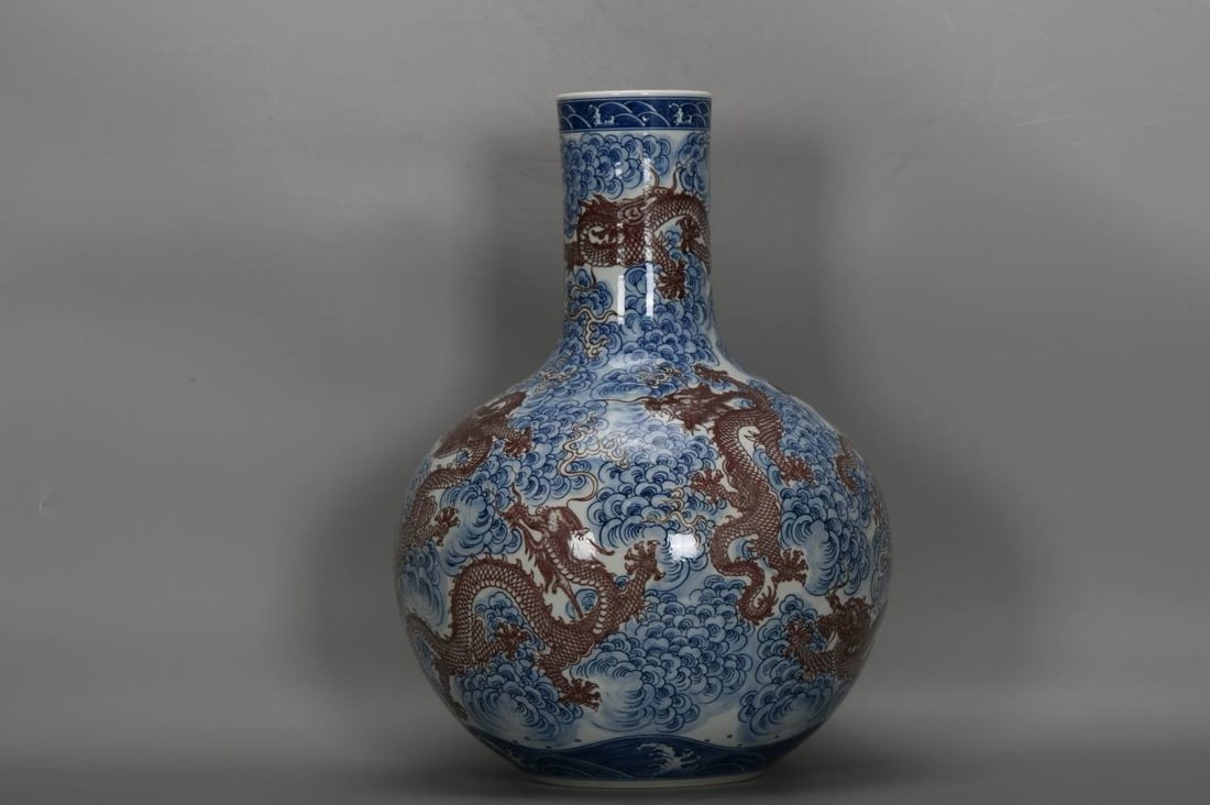 Qing Yongzheng blue and white underglaze red sea water pattern nine dragon celestial globe vase (1 of 8)