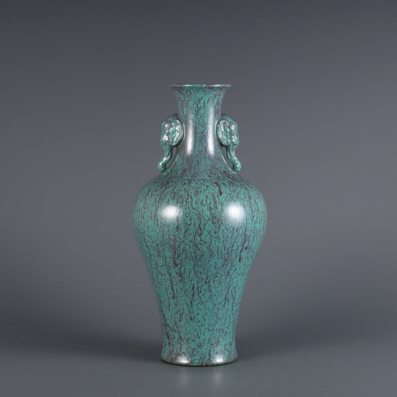 Qing Yongzheng Rujun glaze elephant ear vase: size: height 26.5cm belly diameter 12cm mouth diameter 5.8cm