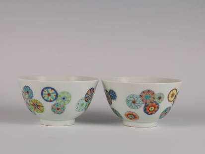 A pair of Doucai leather ball pattern cups made in the Yongzheng period of the Qing Dynasty.: Size: height 6cm diameter 10.5cm