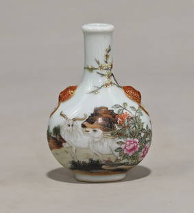A Qing Dynasty Qianlong-era pastel-glazed tobacco pipe with three goats and plum blossoms: , 7.5 cm high and 5.5 cm in diameter.