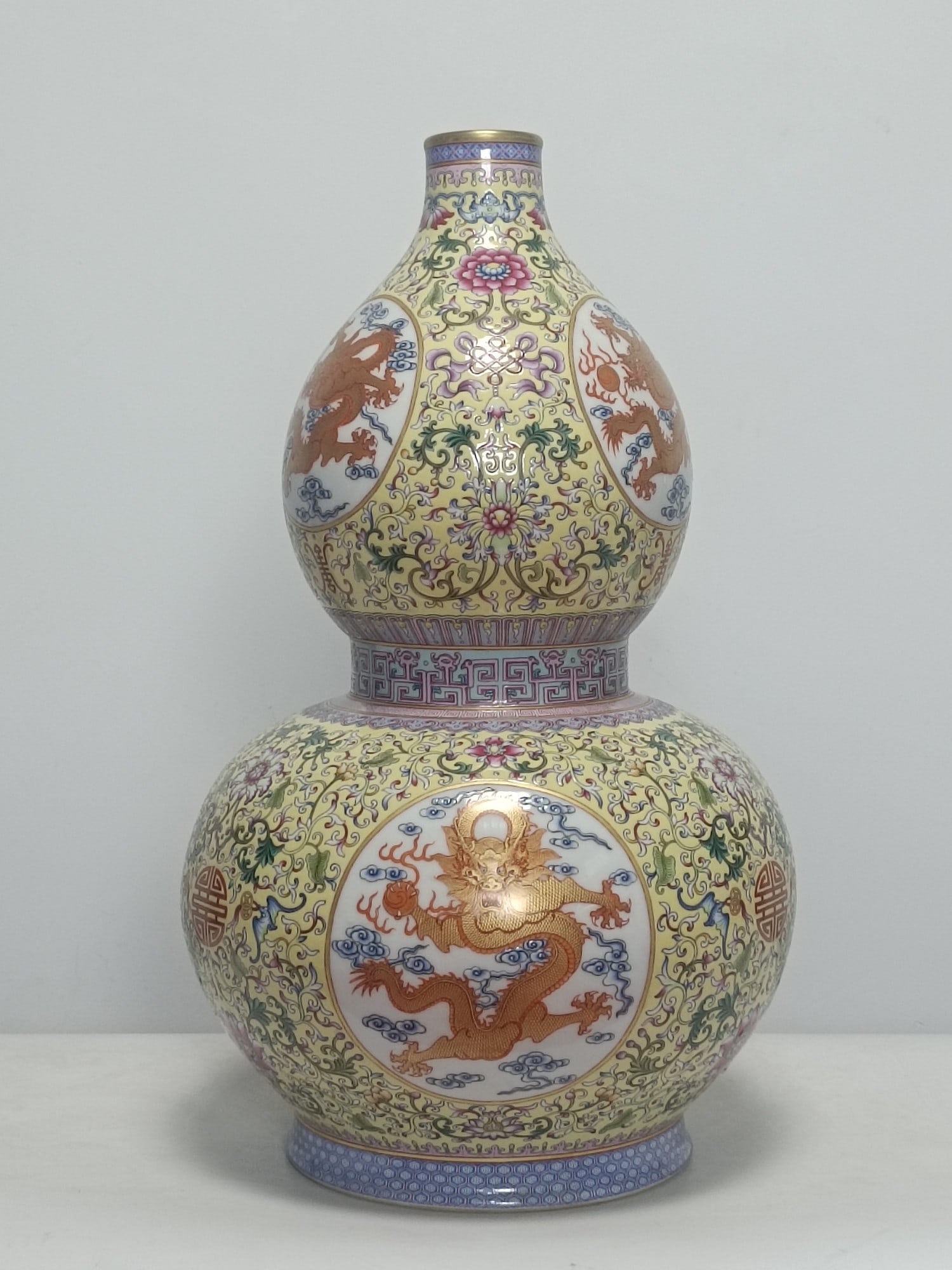 Qing Dynasty Qianlong Mark, Yellow Ground Powder-Rosy Gourd Vase with Dragon Pattern and Window: Height: 52cm Width: 31cm