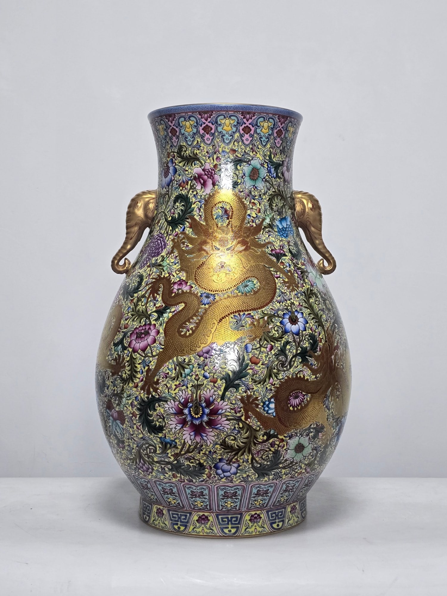 Qianlong Period of the Qing Dynasty, a five-dragon, passionflower-patterned elephant-ear vase with: Height: 54cm Width: 36cm