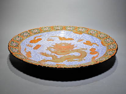 Made in the Qianlong Period of the Qing Dynasty, an enamel-painted plate with seawater carved with: height: 7.5cm, diameter: 42.3cm