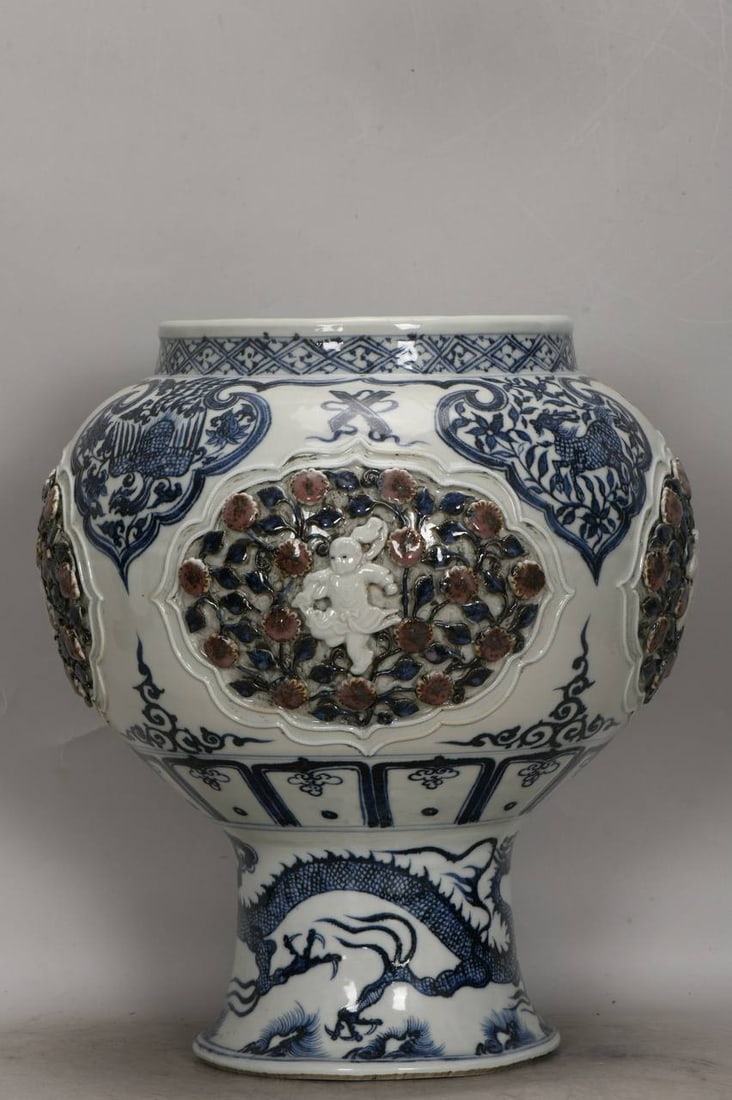 Chinese Yuan Dynasty Blue-and-White Porcelain Stemmed Jar with Sculpted Floral Design (1 of 8)