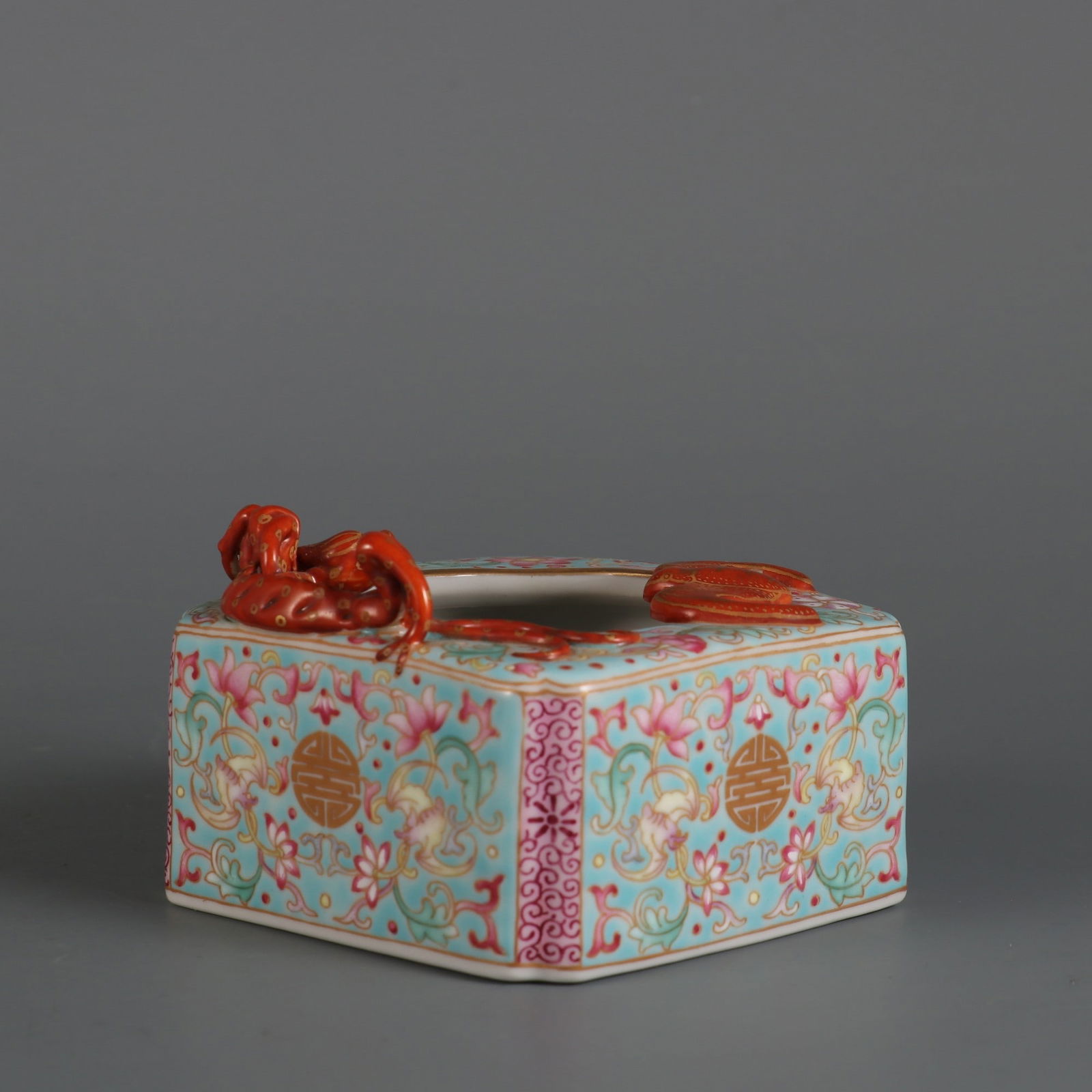 A square washer with a turquoise ground and gold enamel decoration depicting auspicious symbols of: Height 5.8 cm, Diameter 8 cm, Mouth Diameter 5.5 cm.