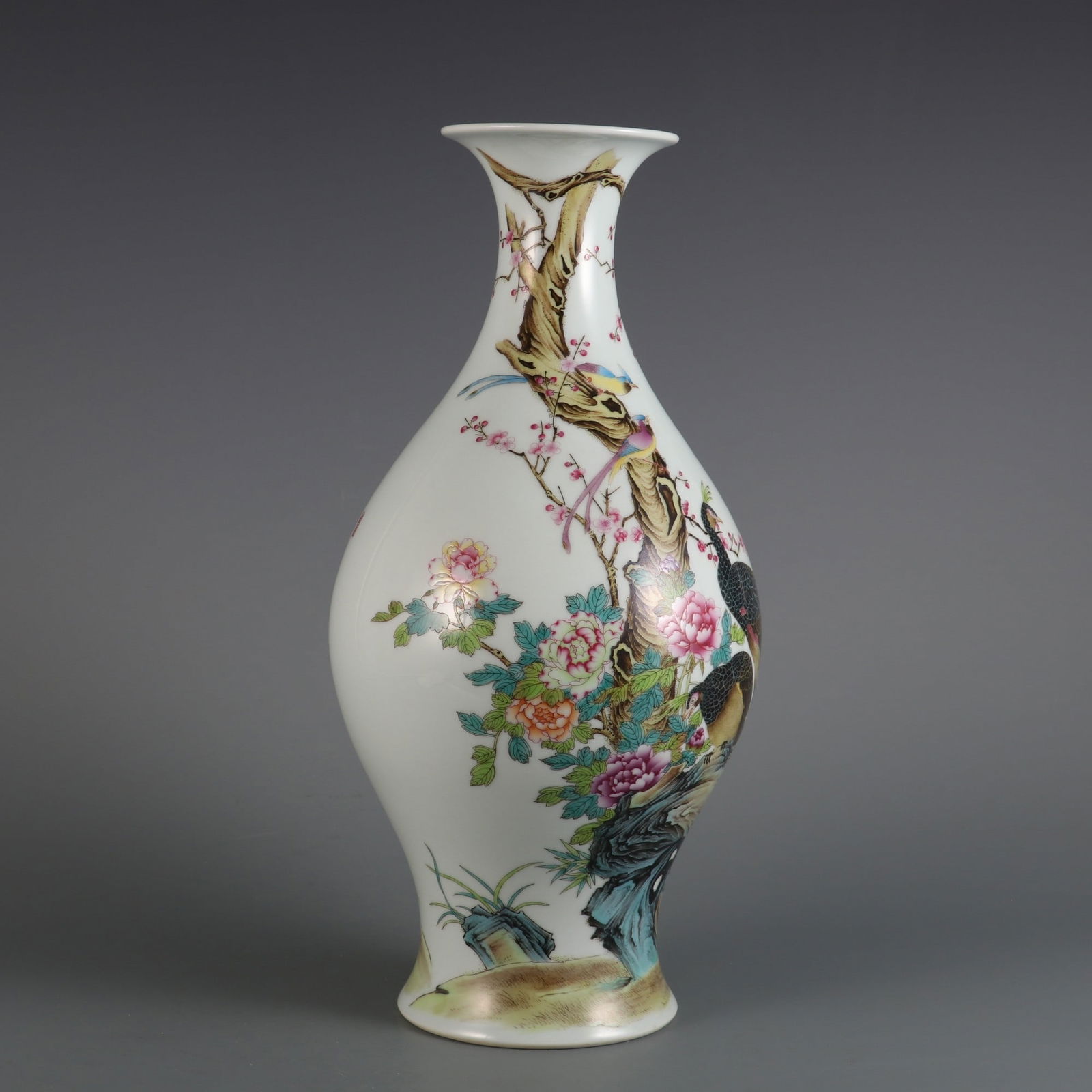 A Qing Dynasty Yongzheng period famille rose olive-shaped vase with floral and bird design and (1 of 9)