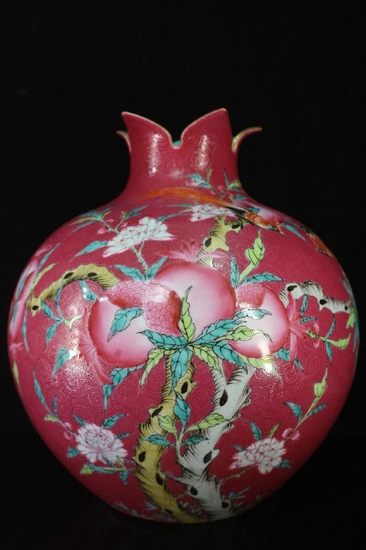 Qianlong period gilt-painted famille rose pomegranate-patterned vase with floral and bird motifs: Qianlong period gilt-painted famille rose pomegranate-patterned vase with floral and bird motifs, 30 cm wide and 32 cm high.