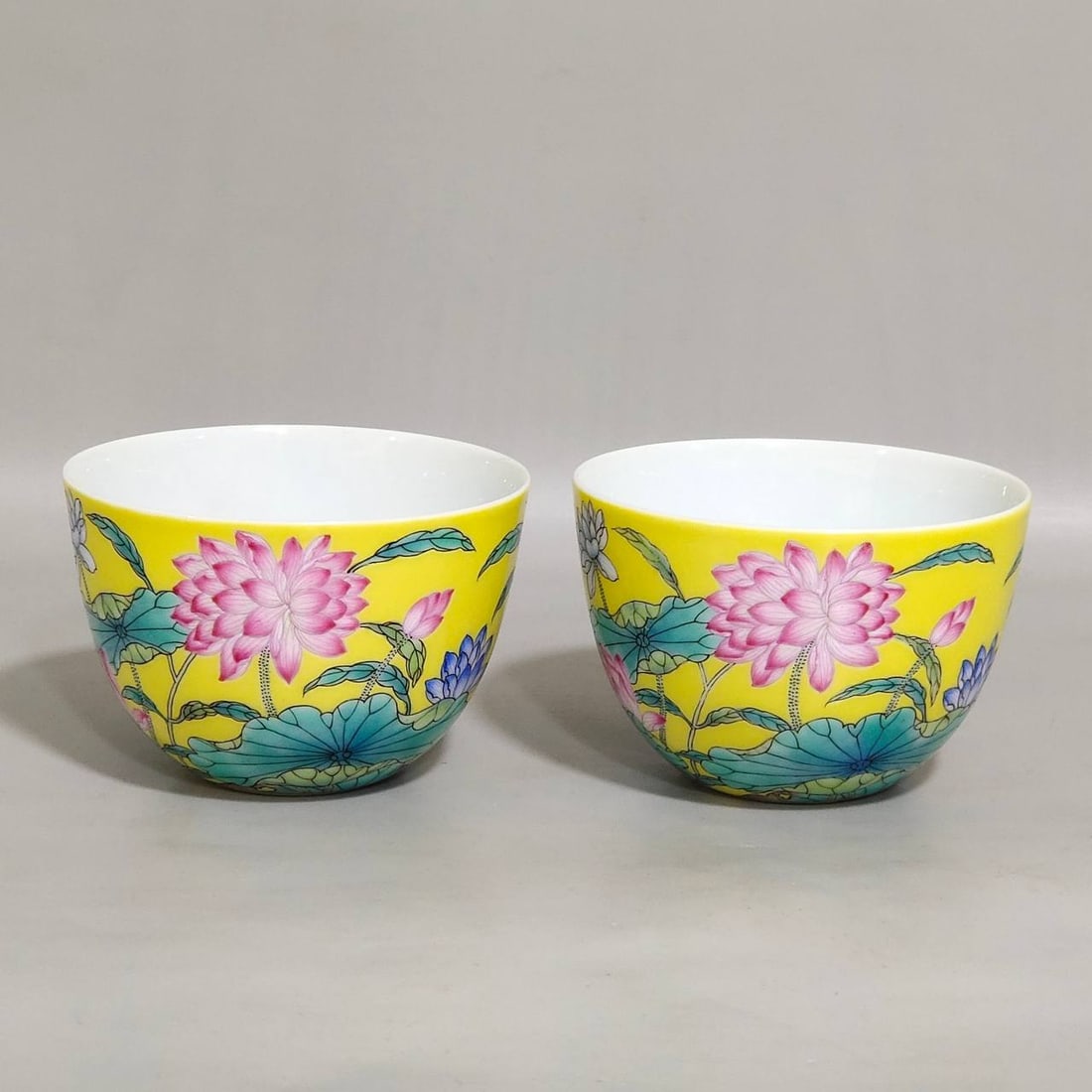 A Qing Dynasty Yongzheng period famille rose lemon-yellow glazed lotus cups (1 of 8)