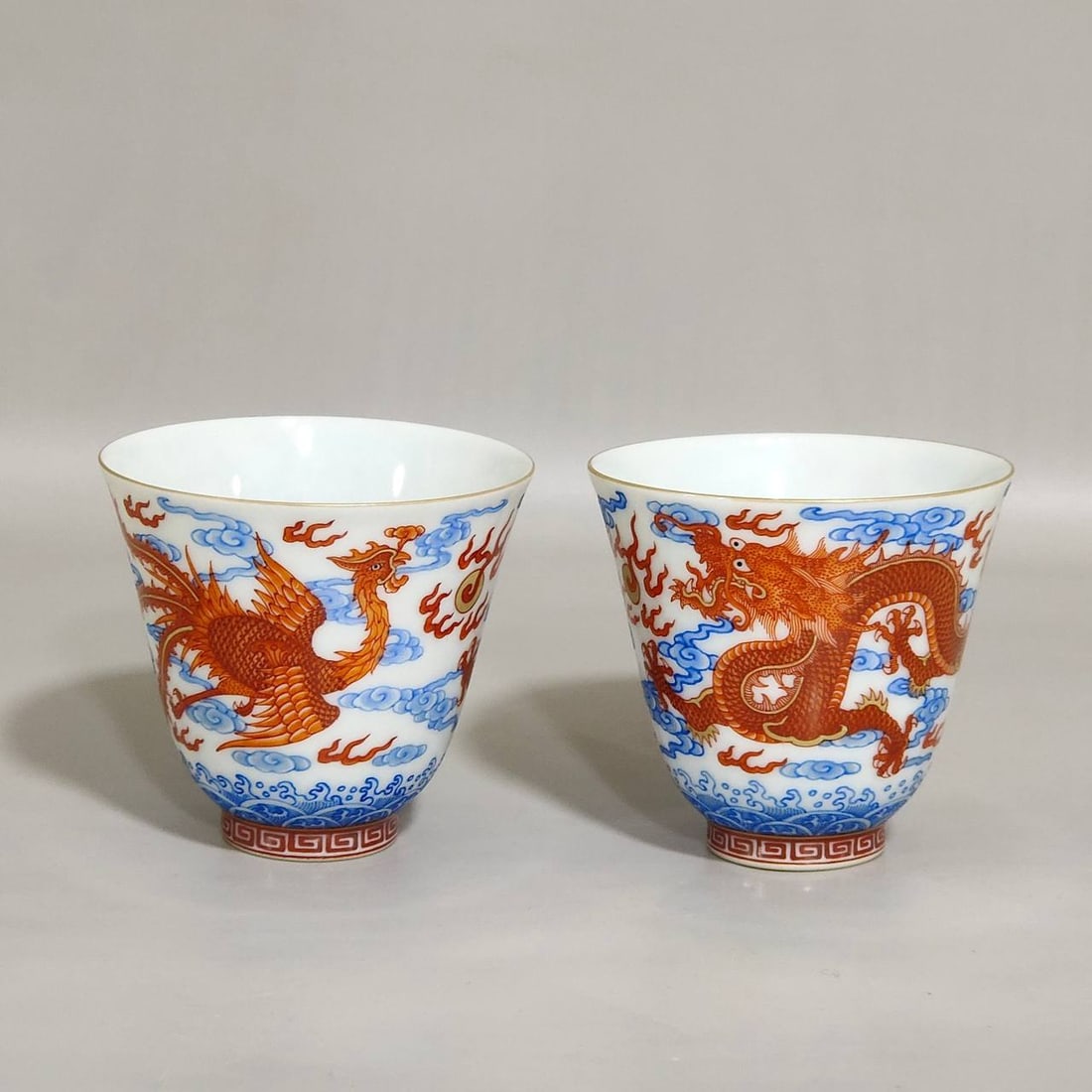 A dragon and phoenix auspicious cup from the Yongzheng period of the Qing Dynasty: A dragon and phoenix auspicious cup from the Yongzheng period of the Qing Dynasty, 5.7 cm high and 6.3 cm in diameter.