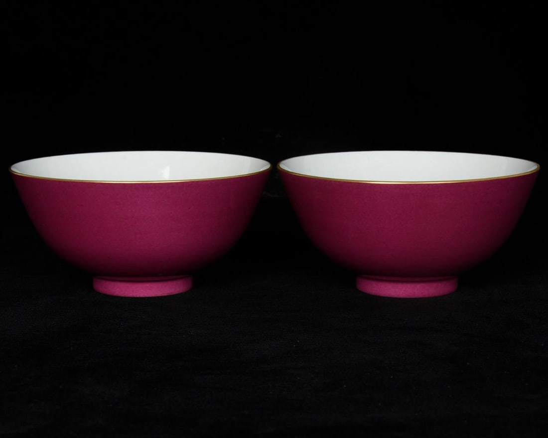 A Qing Dynasty (Yongzheng period) rouge-red glazed bowls: A Qing Dynasty (Yongzheng period) rouge-red glazed bowl with painted enamel on the inside, depicting three fruits. Height: 6.8cm; Diameter: 14.3cm.
