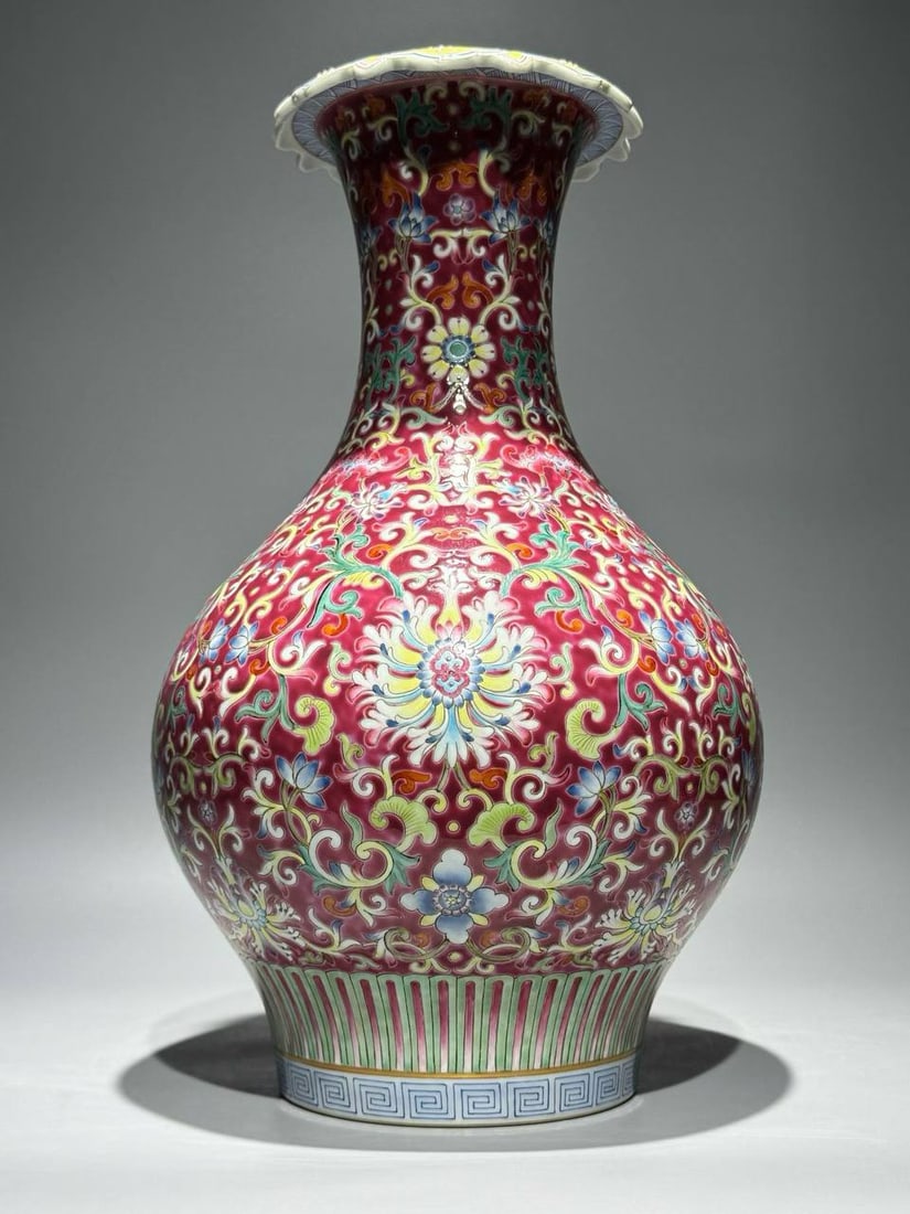 A famille rose vase with a lotus scroll design on a rouge-red ground, Qing dynasty (1 of 8)