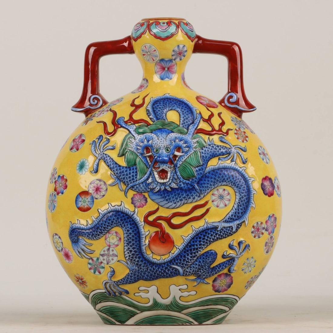 A Qing Dynasty Yongzheng period enamel-gilt relief cloud and dragon pattern double-eared moon flask (1 of 9)