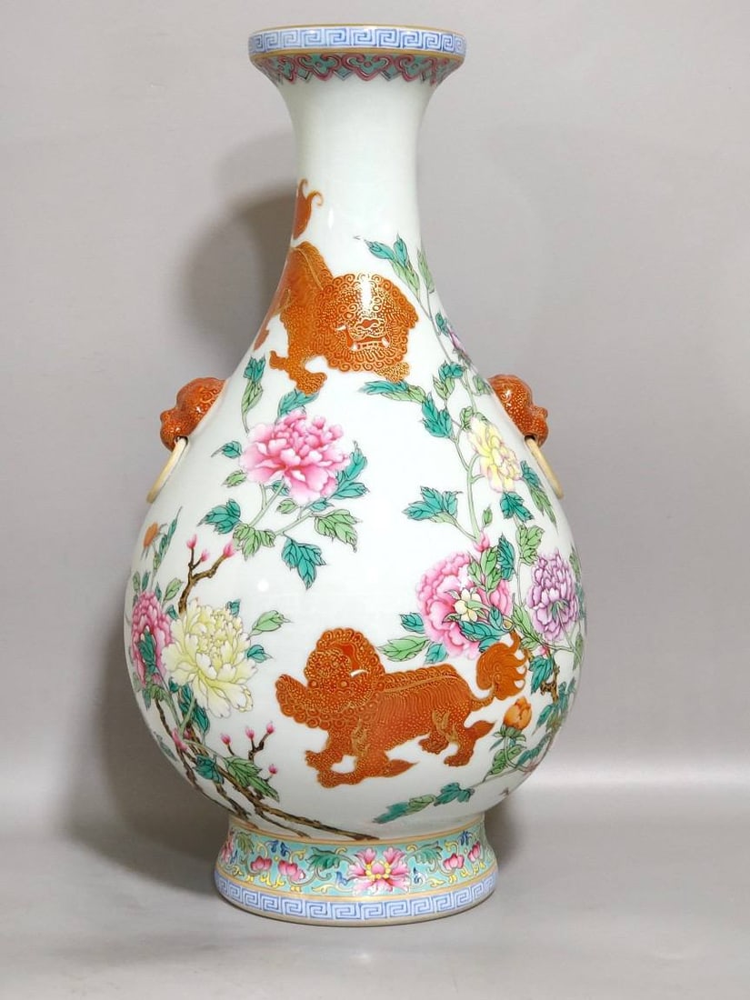 A Qianlong period (Qing Dynasty) double-eared vase with floral (1 of 8)