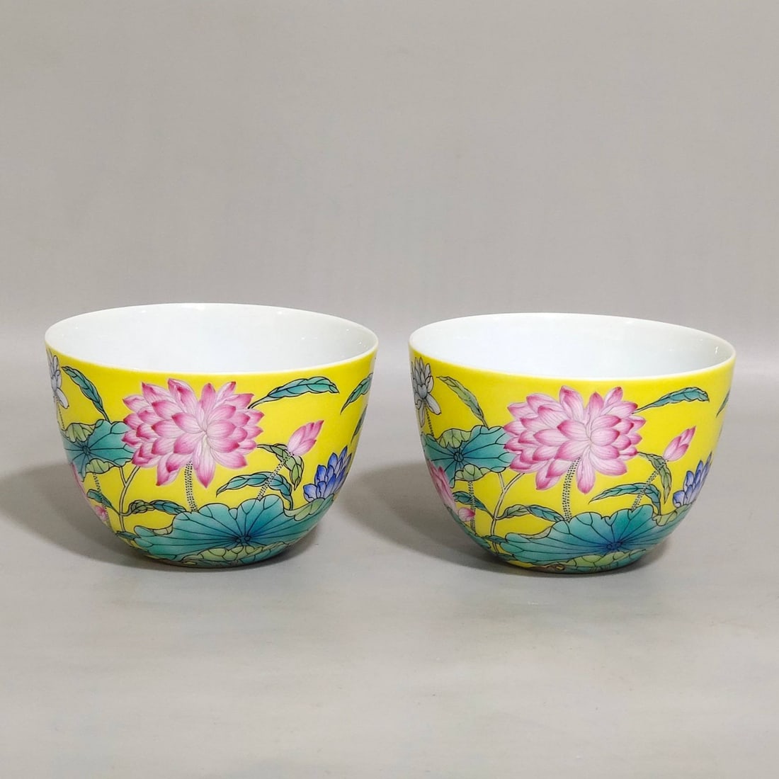 A Qing Dynasty Yongzheng period famille rose lemon-yellow glazed lotus cups (1 of 6)