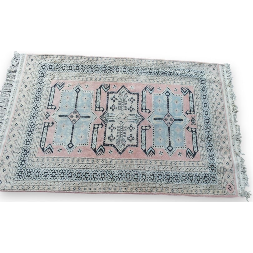 Persian rug with a pink background (1 of 2)
