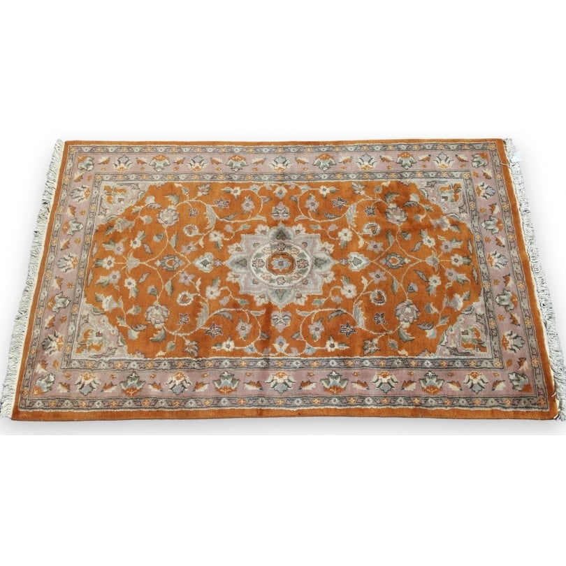 Orange and pink Pakistani rug: Orange and pink Pakistani rugOrigin: EasternPeriod: 20th centuryMaterials: WoolDimensions: Ht 164 x 94 cm
