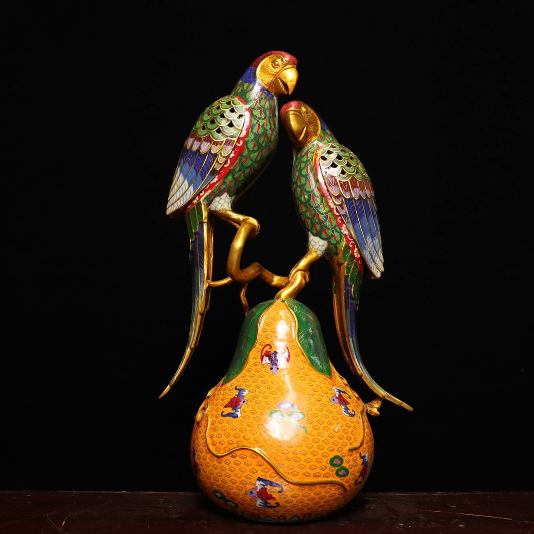 A rare pure copper cloisonné incense burner, featuring a large, handcrafted piece with a parrot: A rare pure copper cloisonné incense burner, featuring a large, handcrafted piece with a parrot motif. The design is unique, with intricate cloisonné workmanship and vibrant colors, resulting in an 
