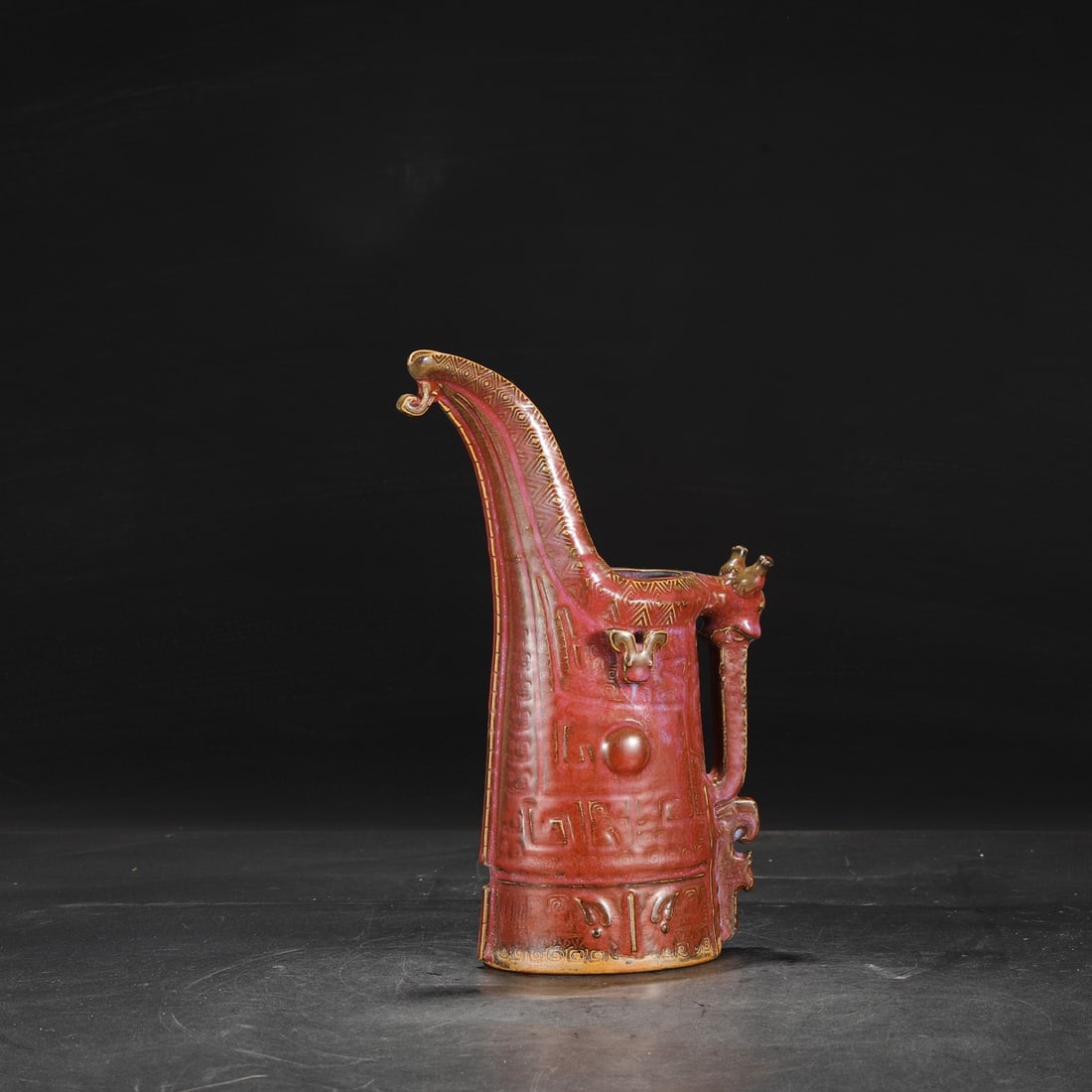 A Northern Song Dynasty Jun ware wine vessel with a grape-red glaze, formerly in the collection,: Dimensions: Height 31 cm, Mouth Diameter 9 cm, Belly Diameter 14 cm.