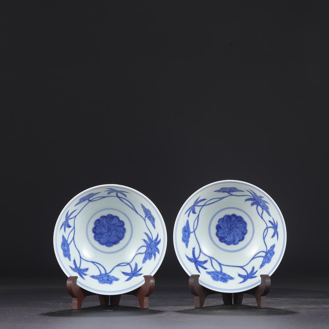A pair of blue-and-white palace bowls from the Chenghua period of the Ming dynasty, formerly in the: Dimensions: Height 6.5 cm, Diameter 15 cm.