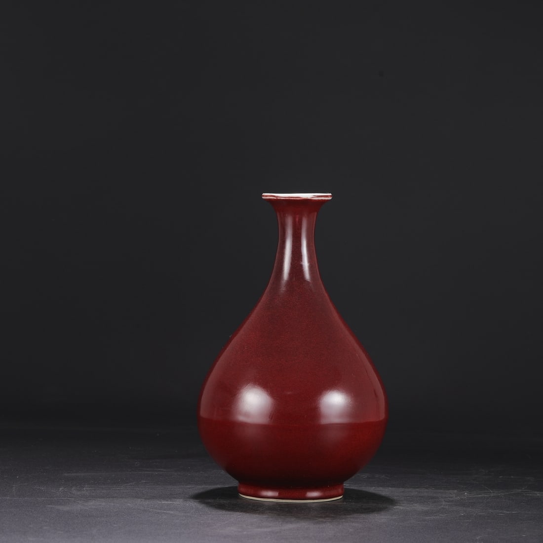 A Ming Dynasty Xuande period ruby-red glazed large Yuhuchun vase, formerly in the collection. (1 of 7)