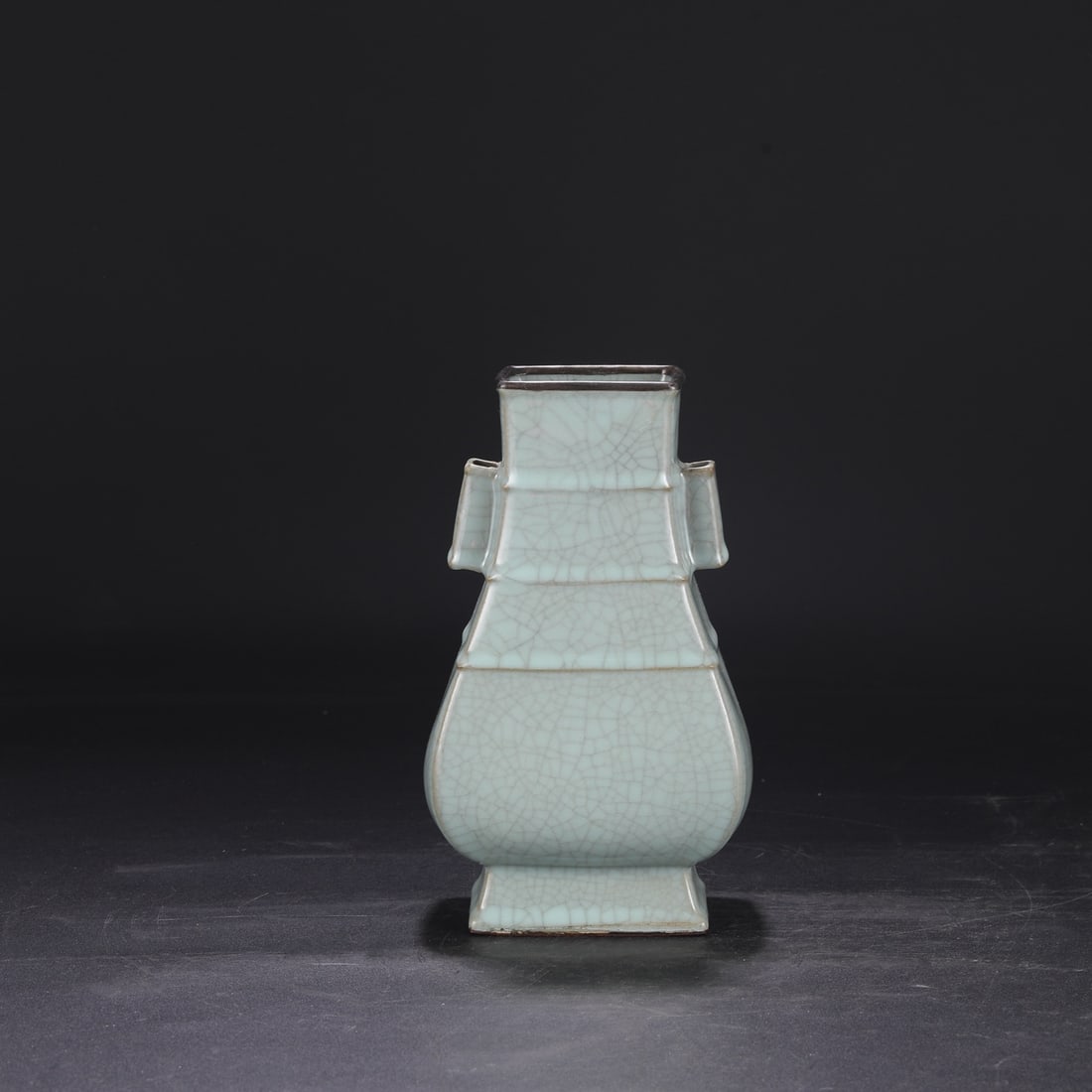 A Southern Song Dynasty official kiln celadon vase with a silver rim, used in the imperial court,: Dimensions: Height 24.5 cm, Mouth diameter 8 cm, Belly diameter 13 cm.
