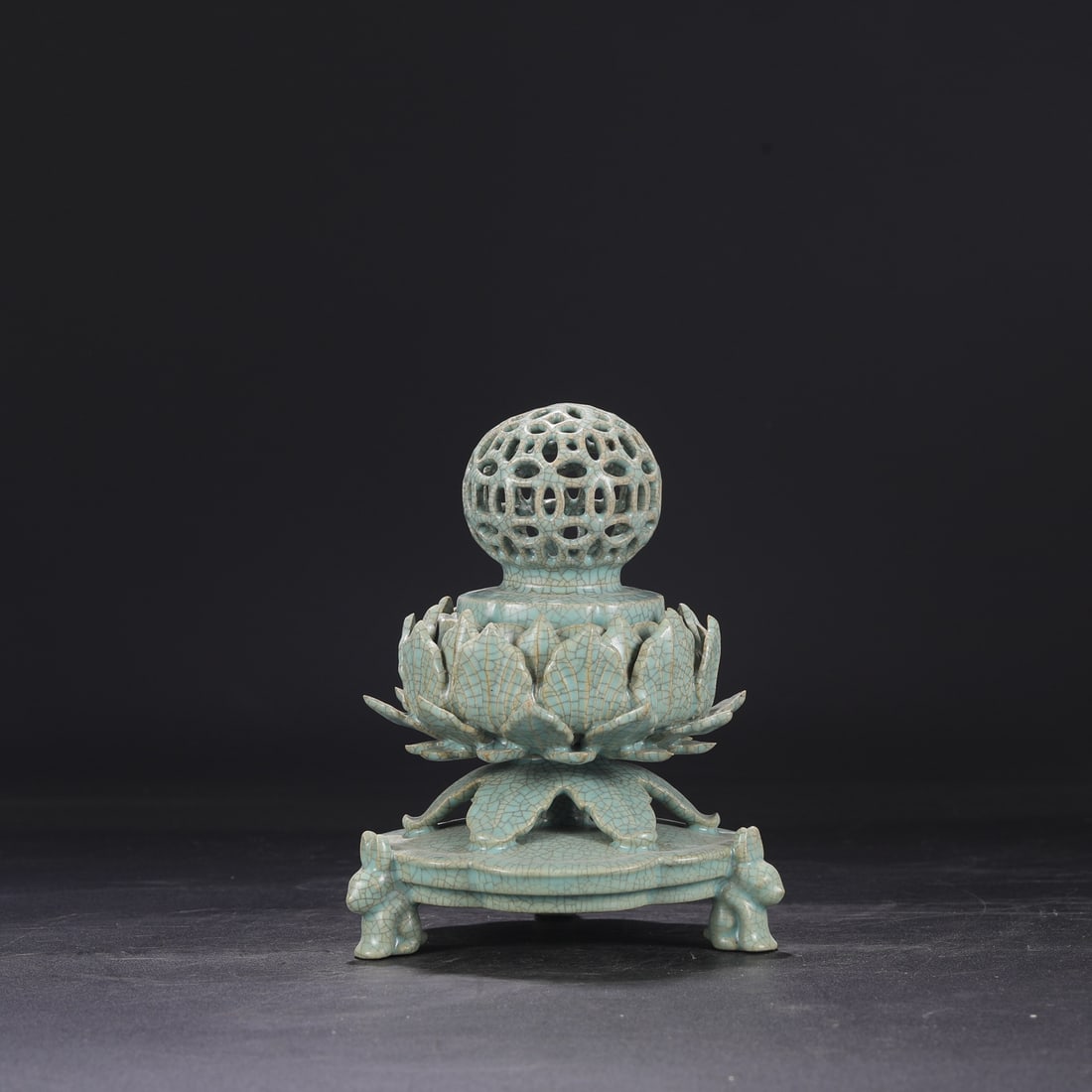 A Northern Song Dynasty Ru ware celadon-glazed imperial lotus-petal openwork covered jar/censer,: Dimensions: Height 20 cm, Mouth diameter 5 cm, Belly diameter 15 cm.