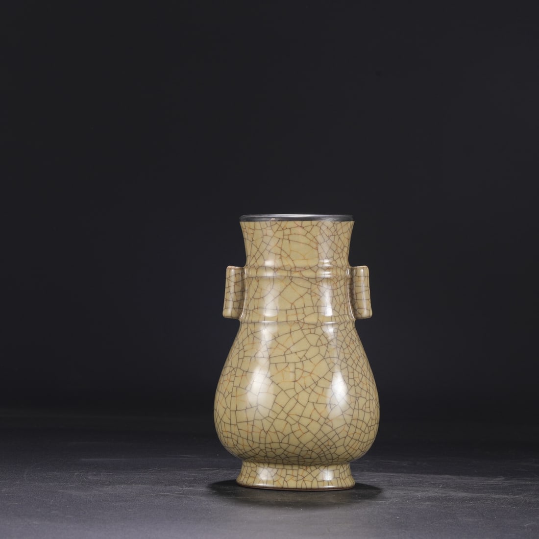 A Northern Song Dynasty Ge ware vase with a beige glaze and silver mouth, formerly in the: Dimensions: Height 23 cm, Mouth diameter 9.5 cm, Belly diameter 13 cm.