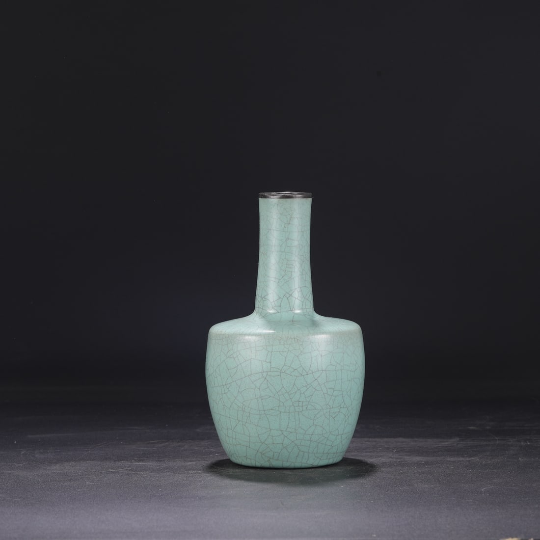 A Northern Song Dynasty Ru ware celadon-glazed silver-rimmed imperial paper-hanging vase, formerly (1 of 6)