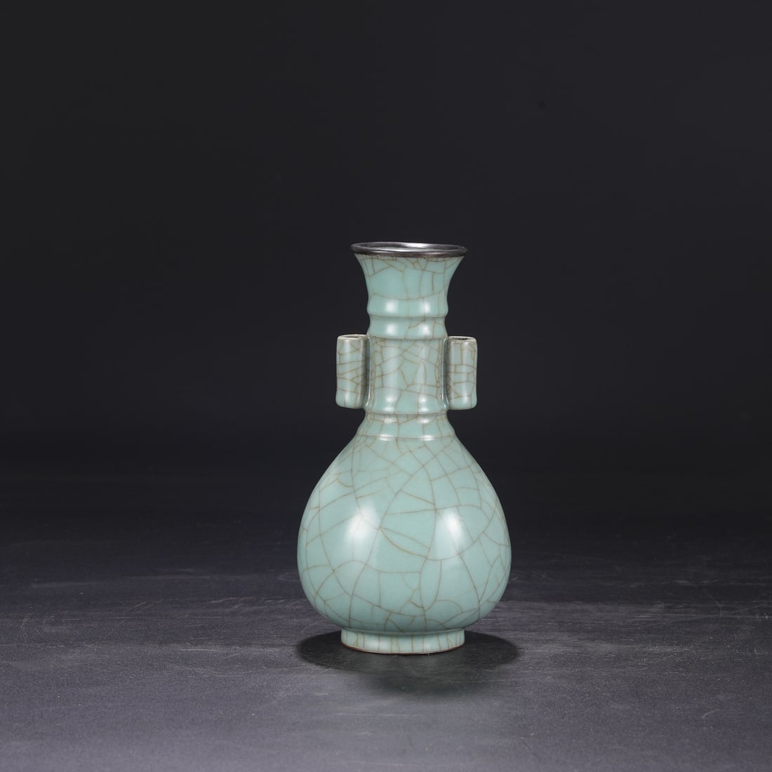 A Southern Song Dynasty official kiln celadon vase with a silver rim and large handles, inscribed (1 of 8)