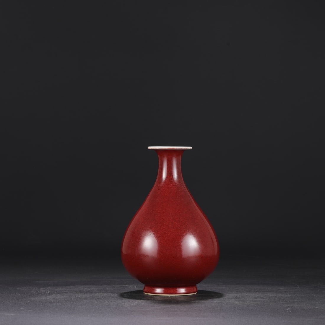 A Ming Dynasty Xuande period ruby-red glazed large Yuhuchun vase, formerly in the collection. (1 of 7)