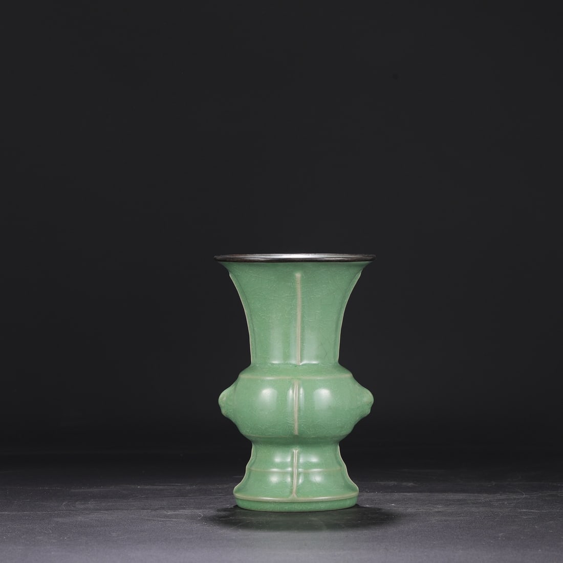 A Northern Song Dynasty Ru ware piece with a jade-green glaze, ice-crack pattern, silver rim,: Dimensions: Height 22 cm, Mouth Diameter 14 cm, Belly Diameter 13 cm.