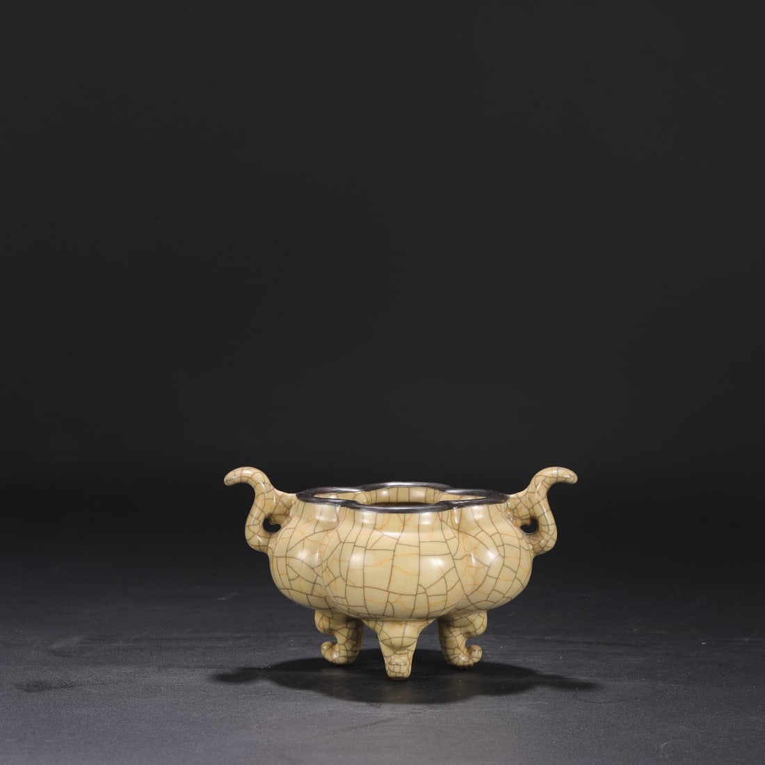 A Northern Song Dynasty Ge ware, beige-glazed, silver-rimmed imperial tripod-shaped incense burner (1 of 7)