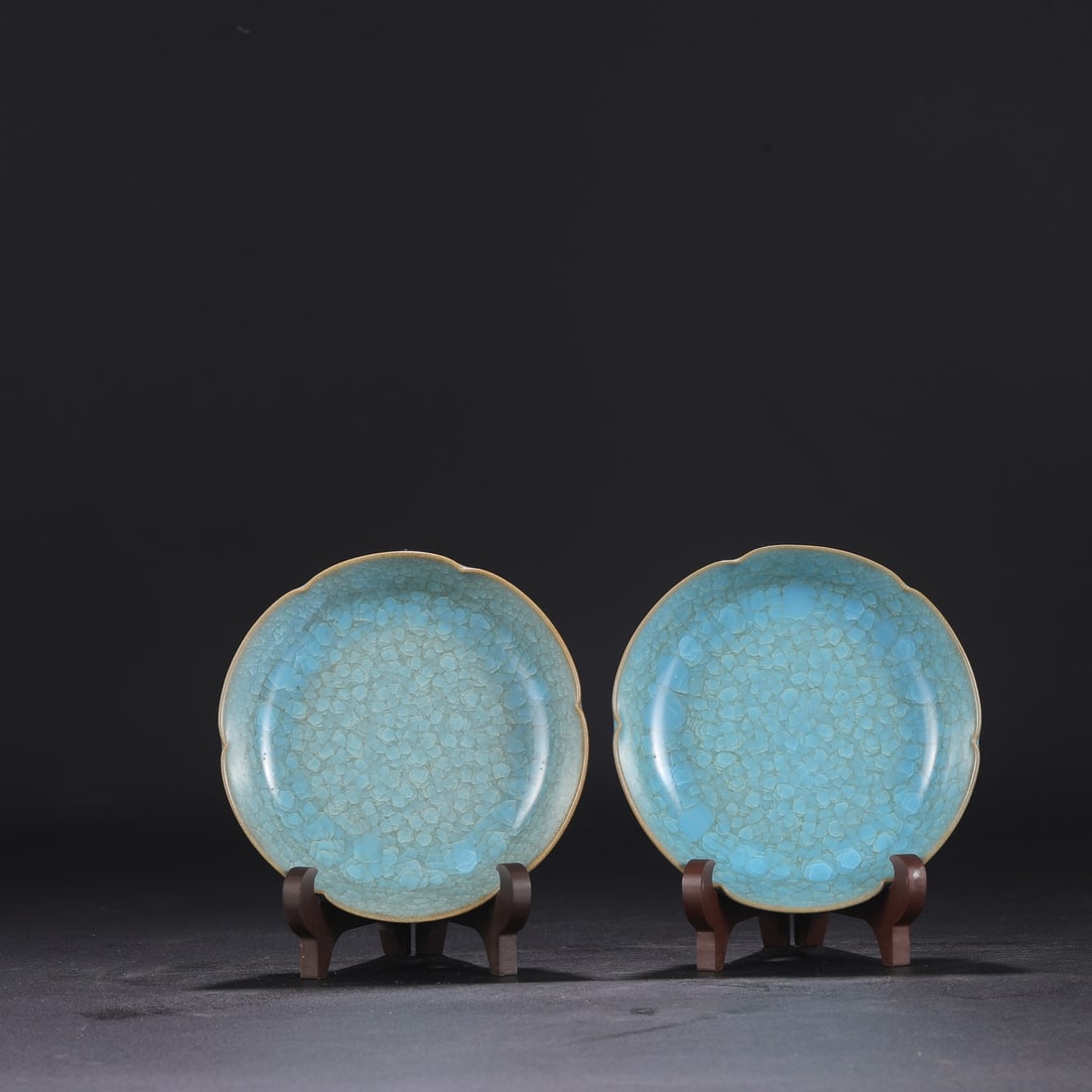 A pair of Northern Song Dynasty Ru ware sky-blue glazed ice-crack pattern imperial flower-shaped (1 of 6)