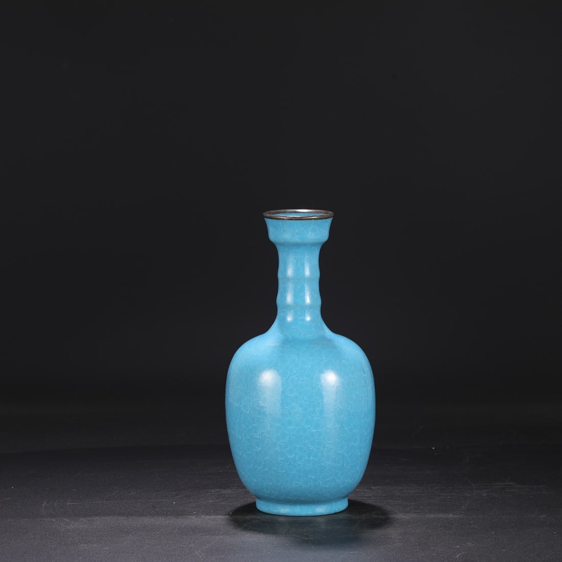 A Northern Song Dynasty Ru ware sky-blue glazed vase with ice-crack pattern and silver rim, used in: Dimensions: Height 27.5 cm, Mouth diameter 6.5 cm, Belly diameter 13 cm.