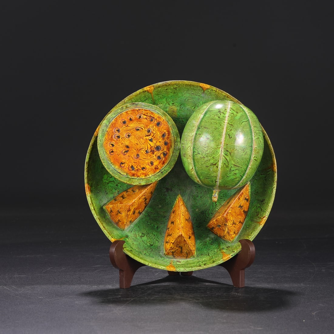 A Tang Dynasty yellow-green glazed marbled watermelon fruit plate from a collection. (1 of 7)