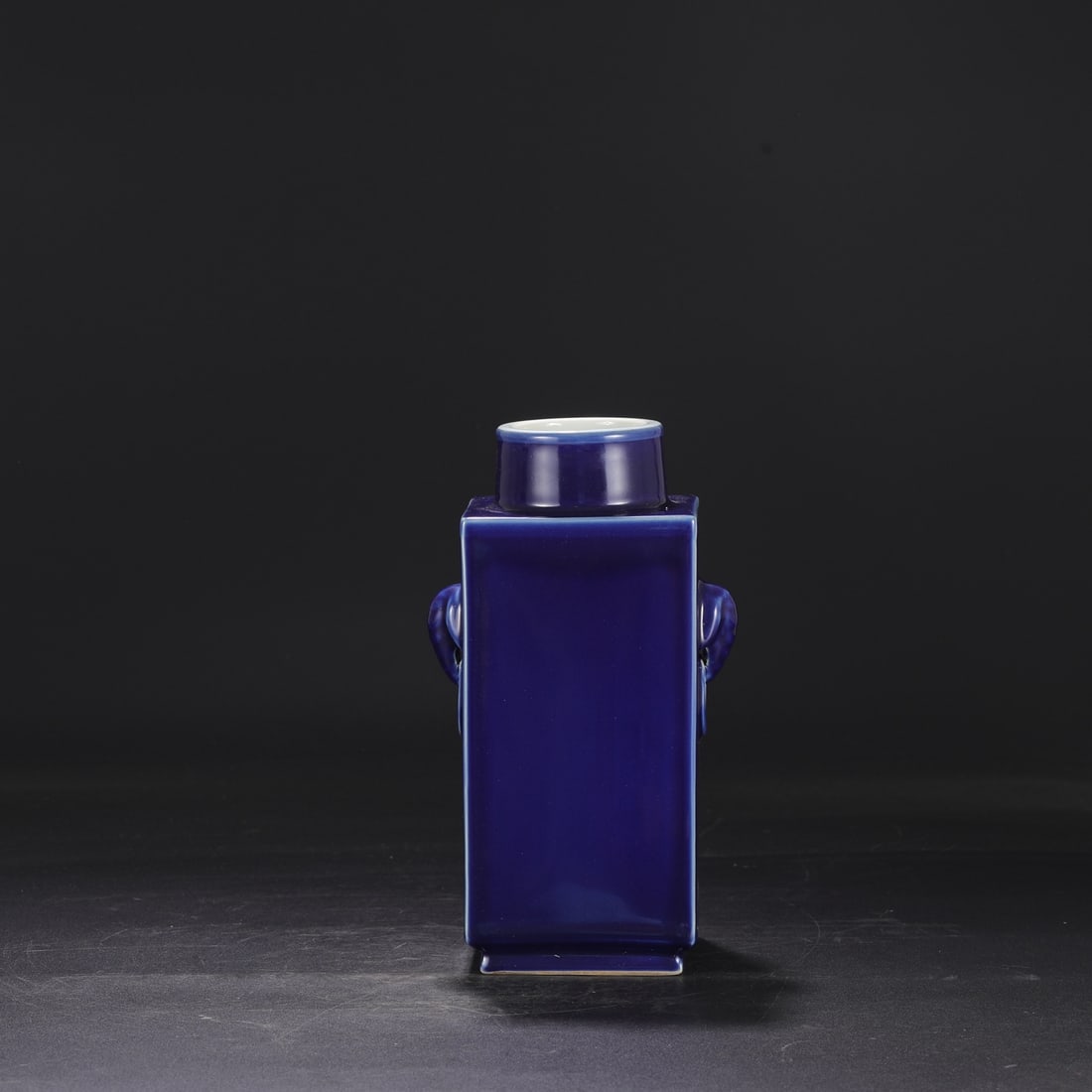 A Qing Dynasty Kangxi period celadon-glazed square cong-shaped vase with animal-shaped handles, (1 of 8)