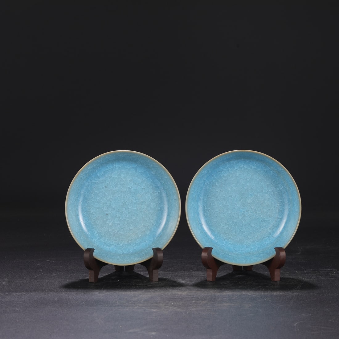 A pair of Northern Song Dynasty Ru ware sky-blue glazed round washers with ice-crack pattern,: Dimensions: Height 4 cm, Diameter 14.5 cm.