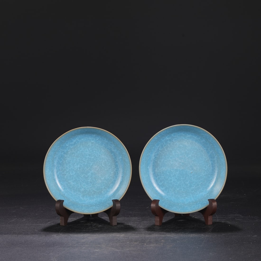 A pair of Northern Song Dynasty Ru ware sky-blue glazed round washers with ice-crack pattern,: Dimensions: Height 4 cm, Diameter 14.5 cm.