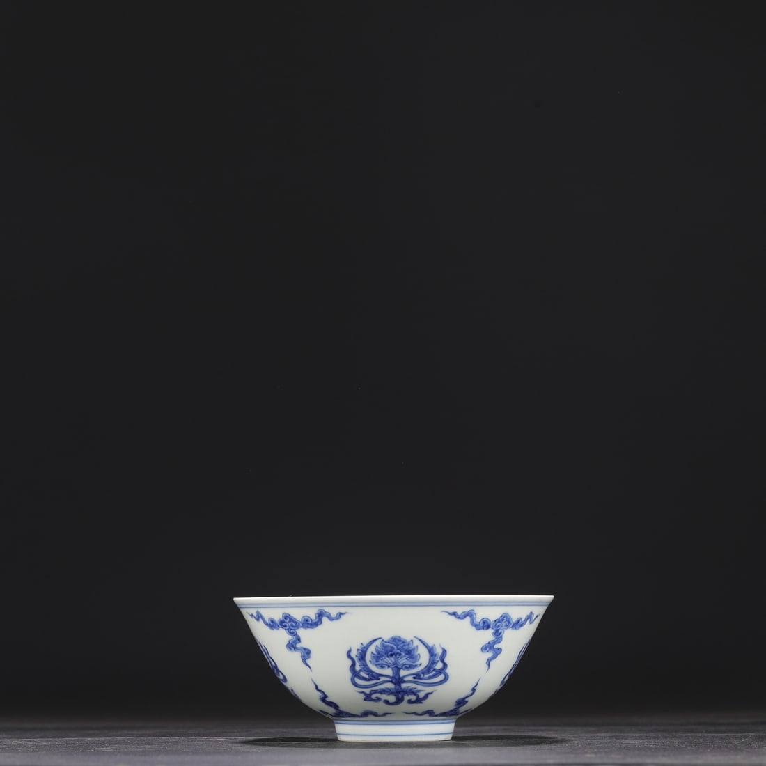A Ming Dynasty Chenghua blue and white porcelain palace bowl with a lotus flower design, formerly in: Dimensions: Height 6.5 cm, Diameter 14.5 cm.
