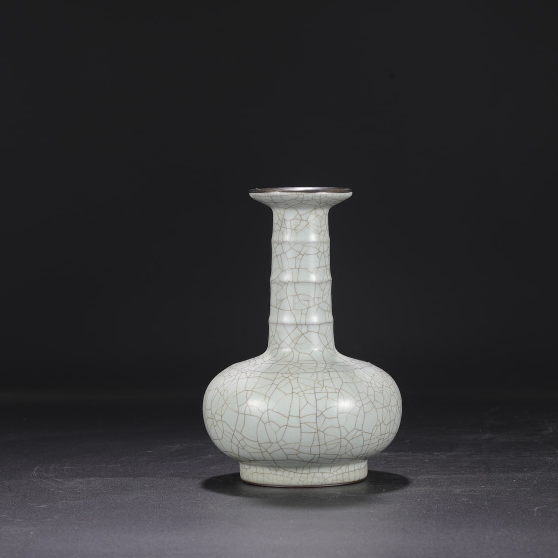 A Southern Song Dynasty official kiln celadon vase with a silver rim, used in the imperial court and (1 of 7)