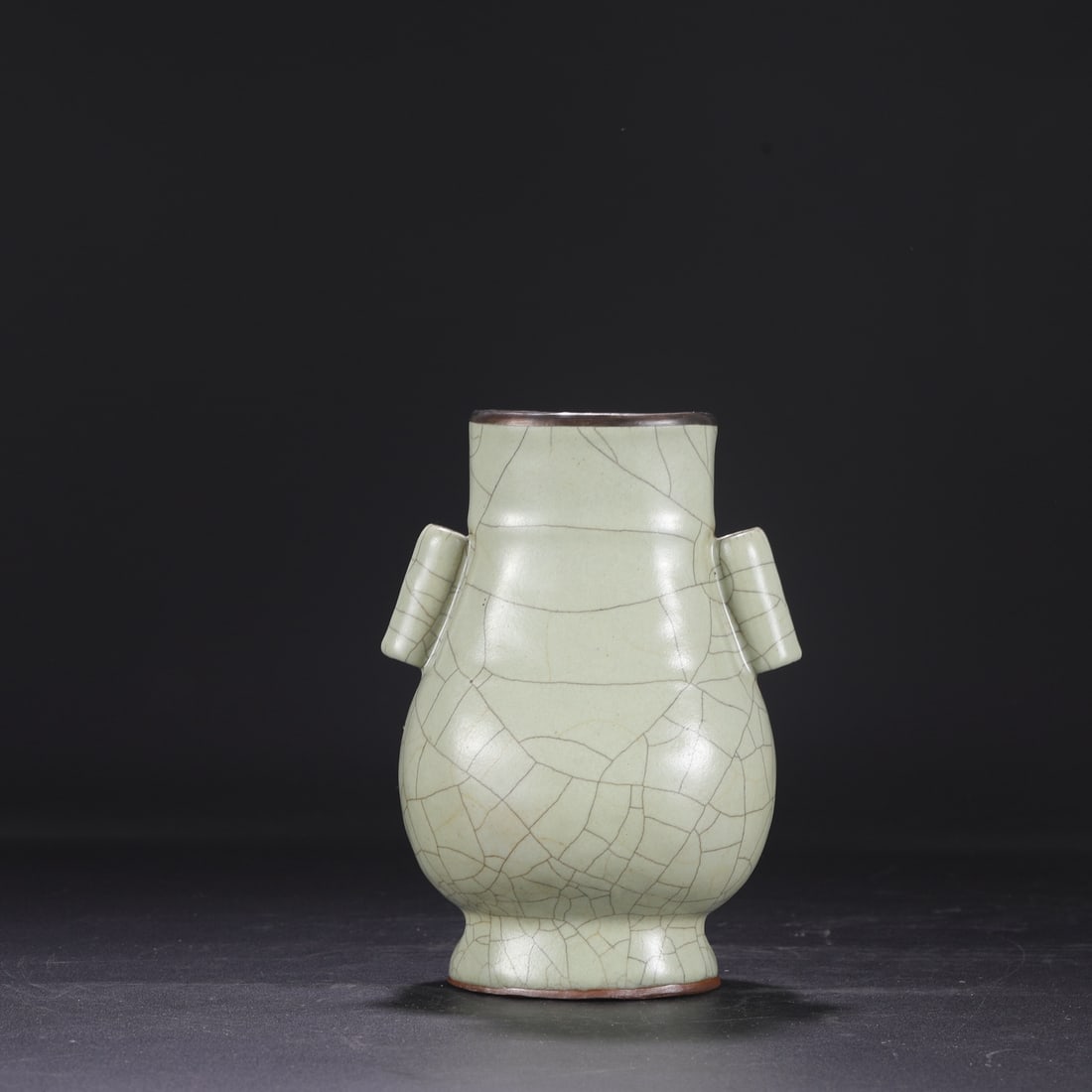 A Southern Song Dynasty official kiln celadon vase with a silver rim, used in the imperial court and: Dimensions: Height 22 cm, Mouth diameter 9 cm, Diameter 15.5 cm.