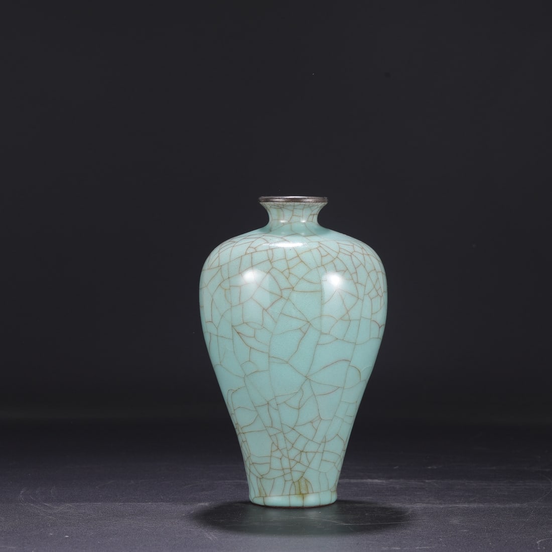 A large Southern Song Dynasty official kiln celadon plum vase with a silver rim, formerly in the (1 of 7)