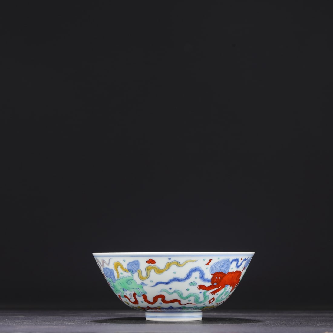 A Ming Dynasty Chenghua period doucai (enamel overglaze enamel) palace bowl with lion and: Dimensions: Height 7 cm, Diameter 15.5 cm.