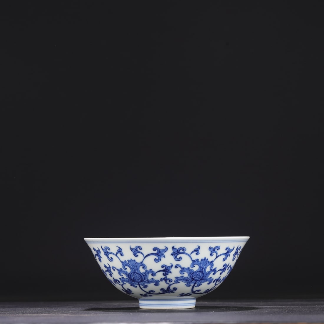 A Ming Dynasty Chenghua blue and white porcelain palace bowl with a scrolling floral design, (1 of 8)