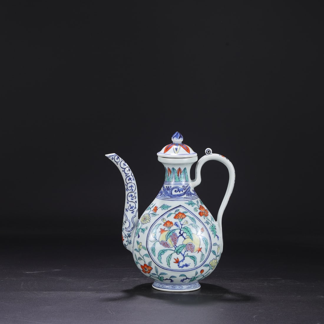 A large Ming Dynasty Xuande period polychrome ewer with openwork floral and fruit design. (1 of 8)