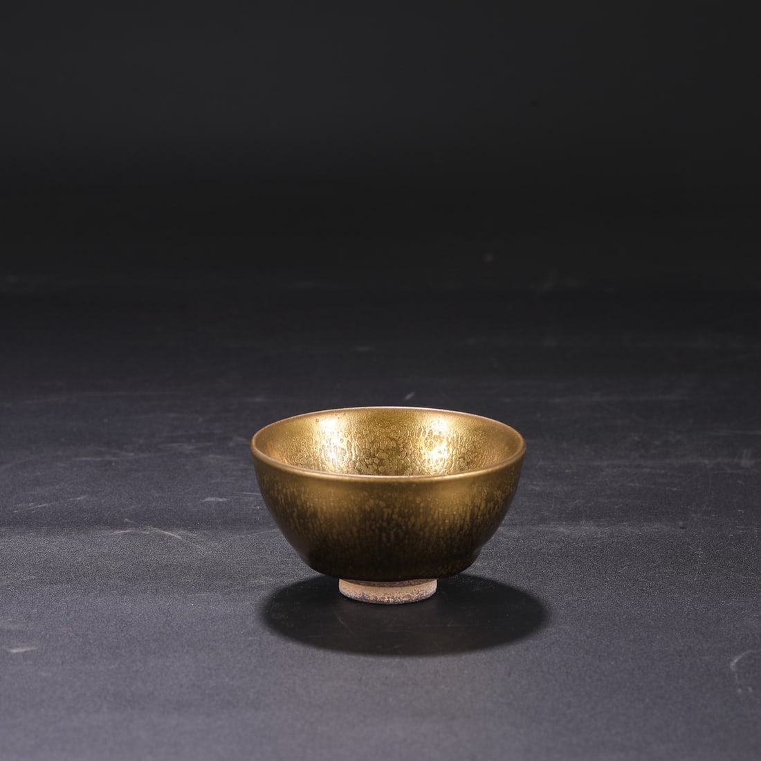 A Northern Song Dynasty Jian ware gold-glazed oil-spot tea bowl from a collection. (1 of 7)