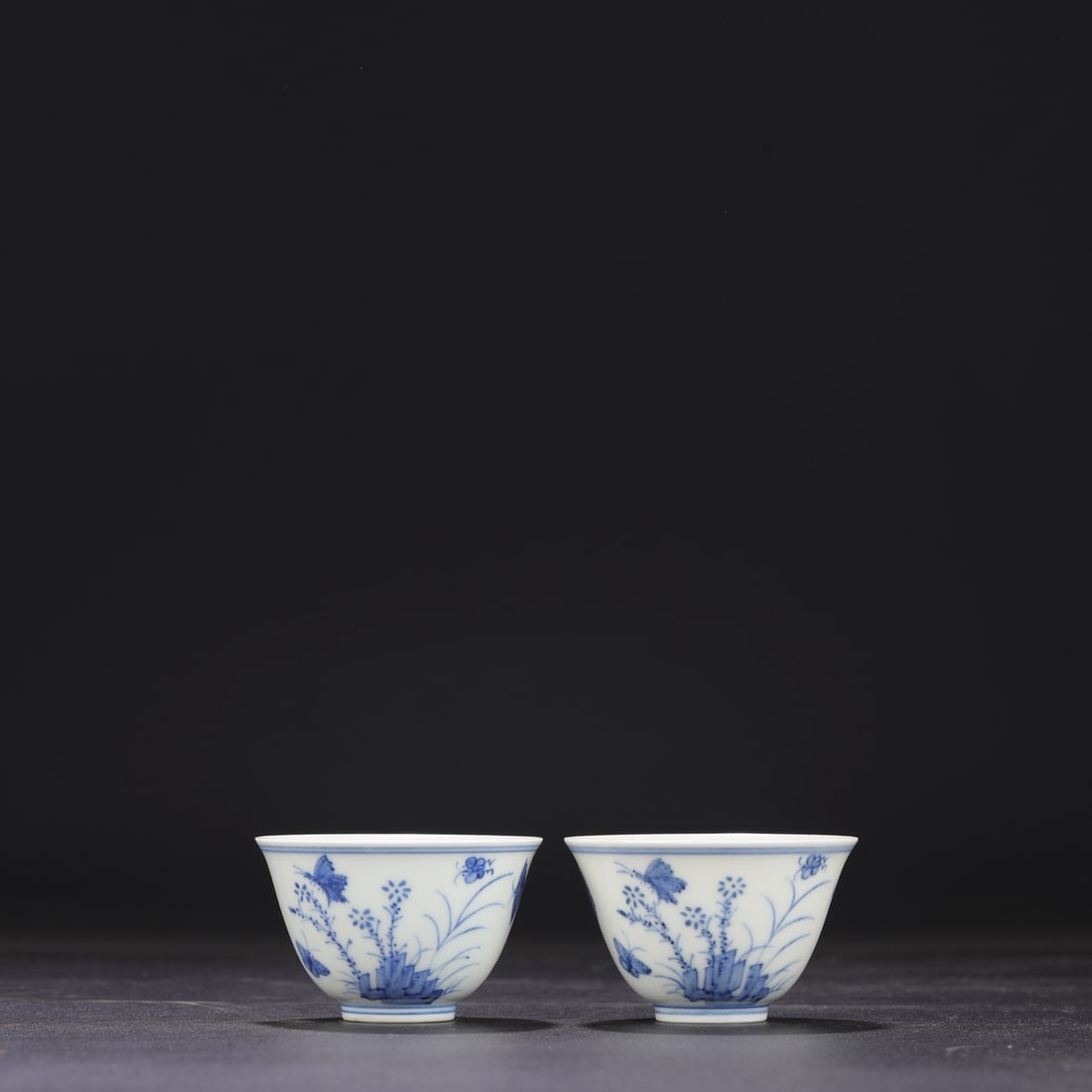 A pair of blue and white "Three Autumns" cups from the Chenghua period of the Ming Dynasty, formerly (1 of 7)