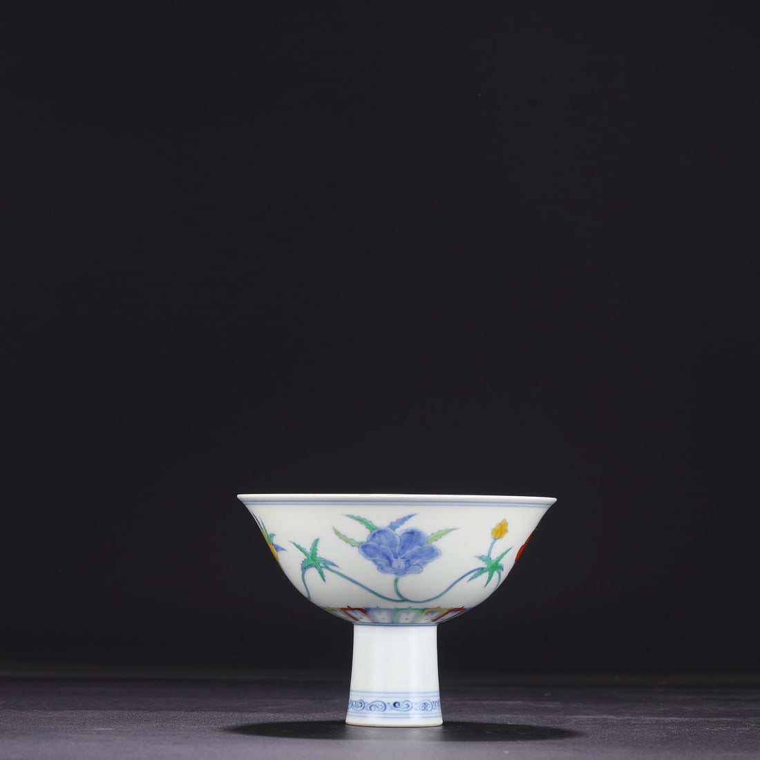 A Ming Dynasty Chenghua period doucai (enamel overglaze enamel) stem bowl with a floral scroll (1 of 8)