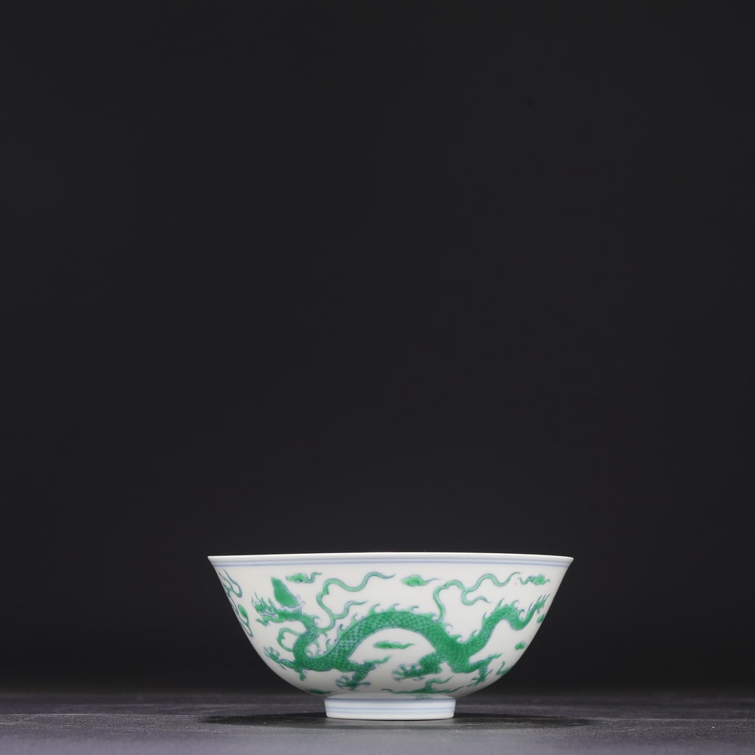 A Ming Dynasty Chenghua period green-enamel dragon and cloud design palace bowl, formerly in the (1 of 6)