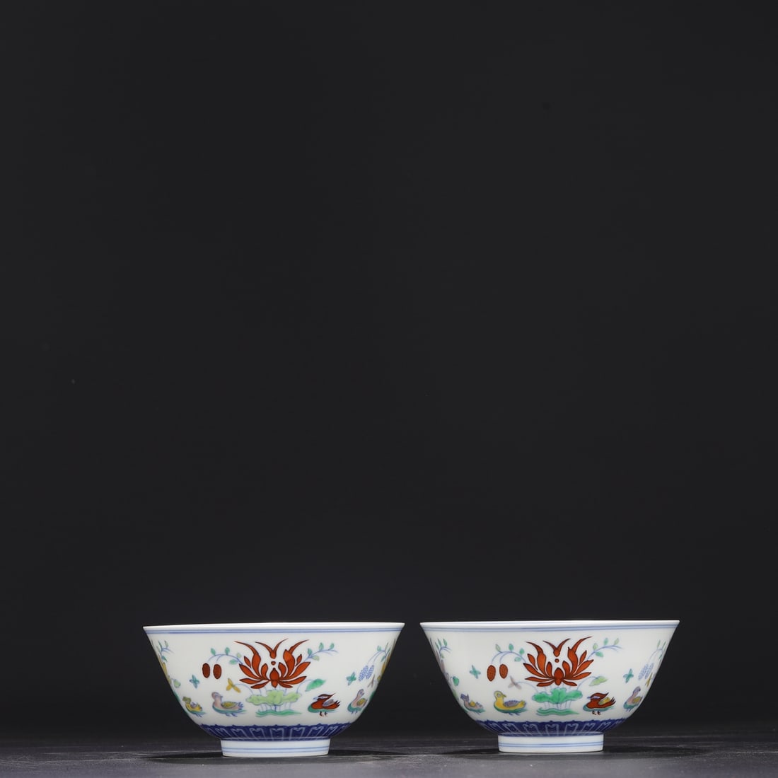 A pair of Ming Dynasty Chenghua doucai palace bowls with mandarin duck and waterweed design,: Dimensions: Height 7.8 cm, Diameter 15.5 cm.